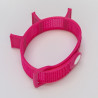 Pink tool-band coiled into a loop.